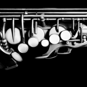 Refurbished alto saxophone on a neutral studio background
